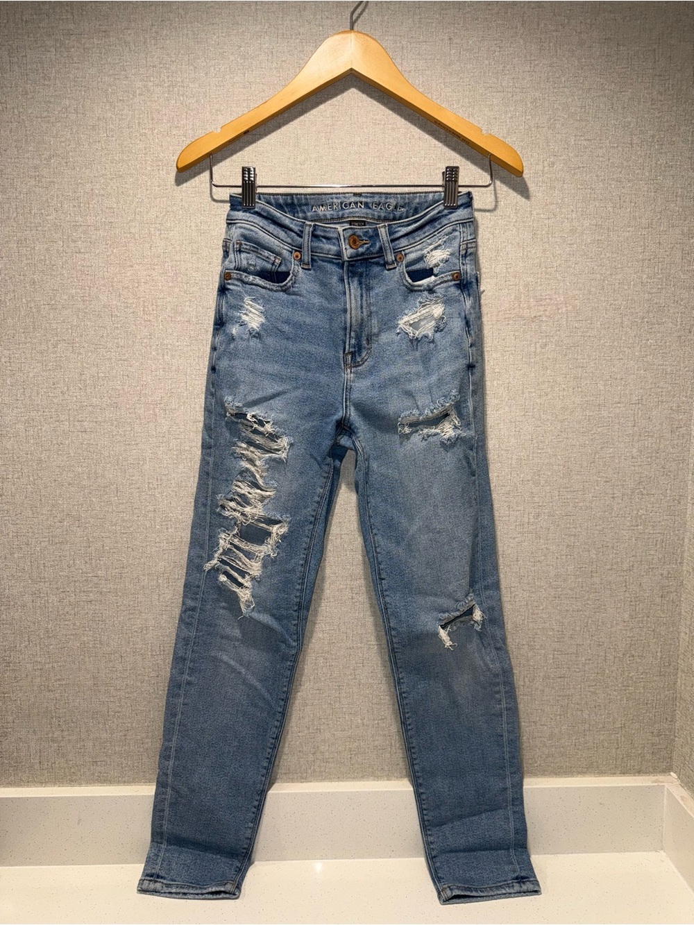 {American Eagle Outfitters} Light Blue High-Rise Distressed Jeans